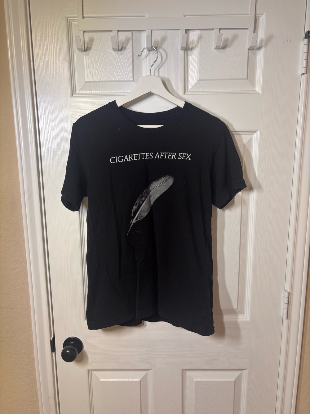 Black Graphic Tee with Feather Print